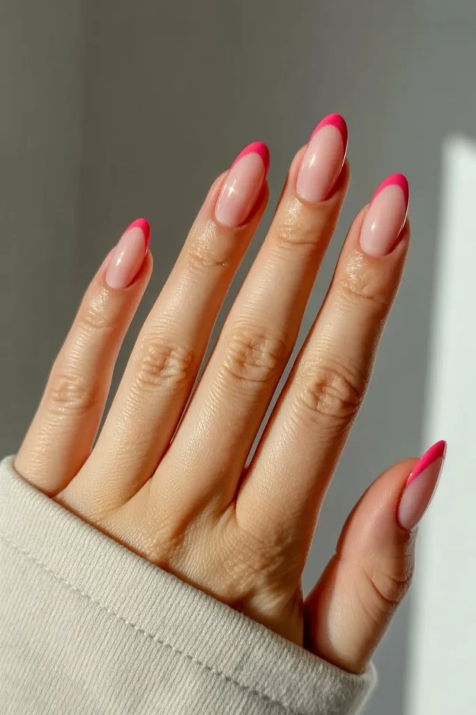 Short nude nails with pink heart tip