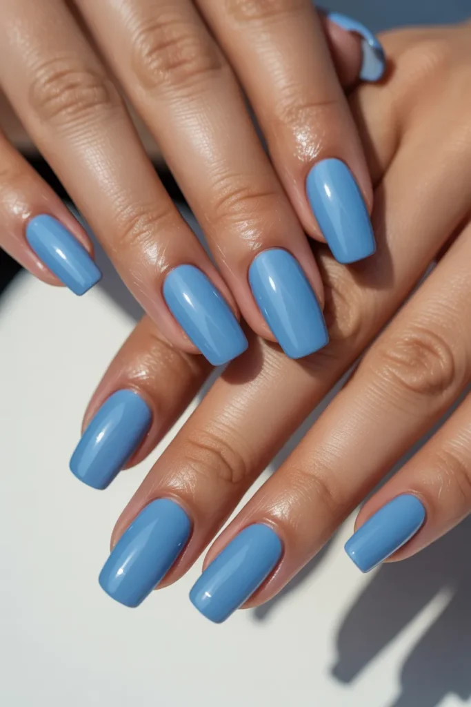 Baby blue glossy gel nails, coffin shape