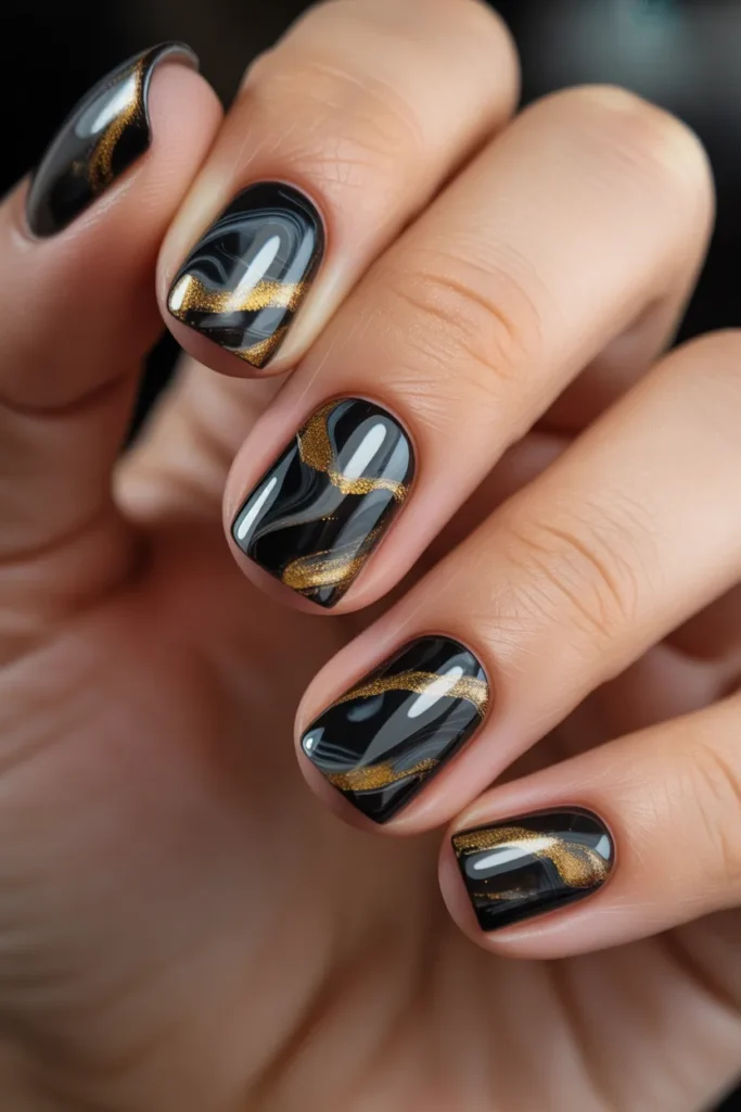 Black and gold marble nails