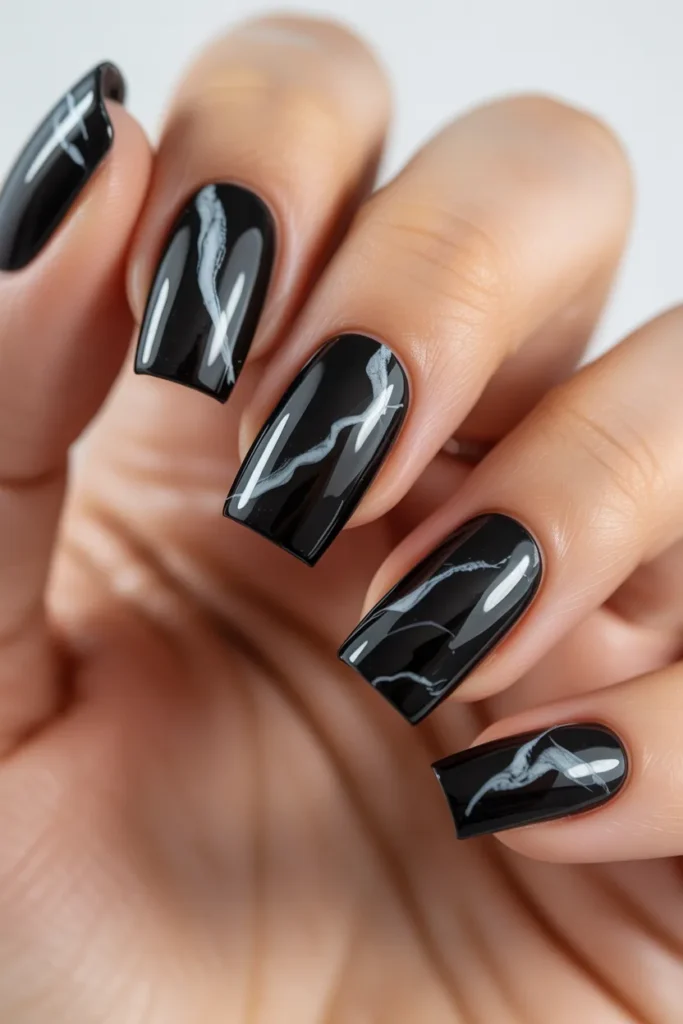 Black nails with white marble streaks
