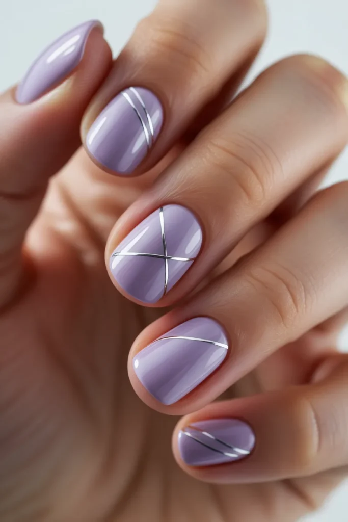 Lavender nails with thin silver line accents