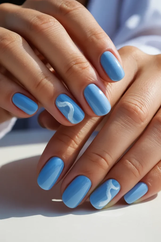  Light blue nails with glossy finish