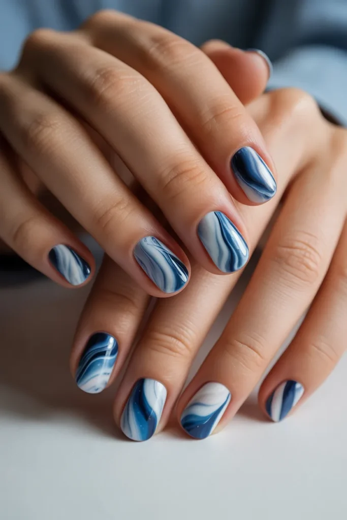 Marble nails in shades of blue and white