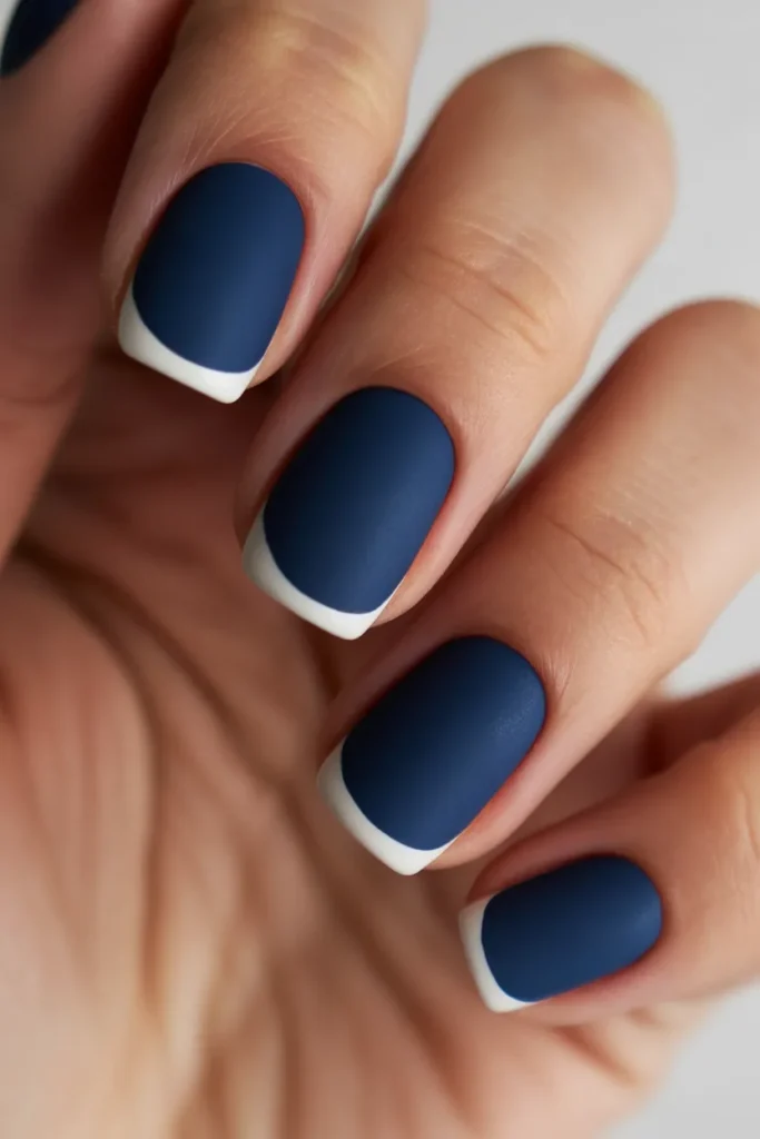 Matte navy nails with glossy tips