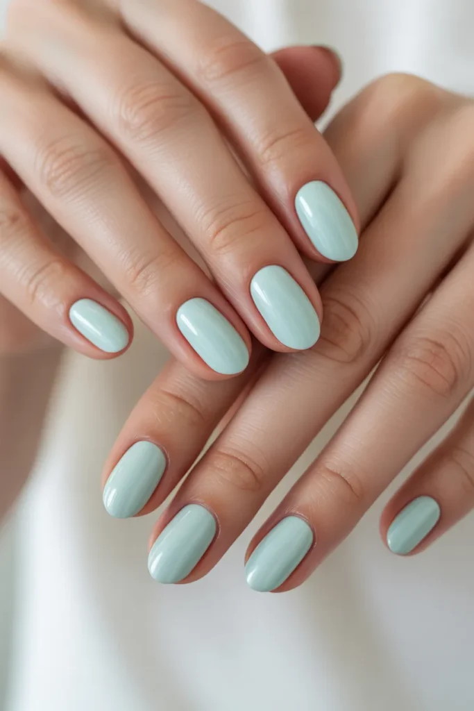 Mint green pastel oval nails