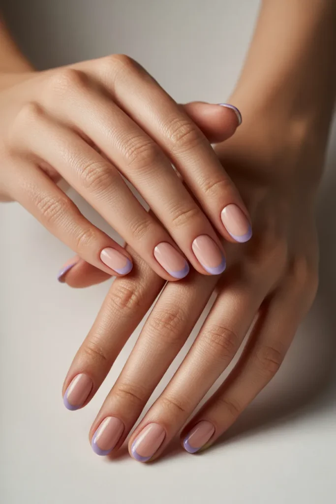 Nude nails with soft blueberry purple tips