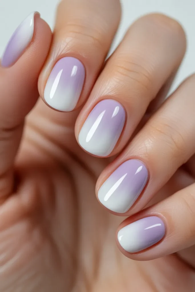 Ombre nails blending white to lavender