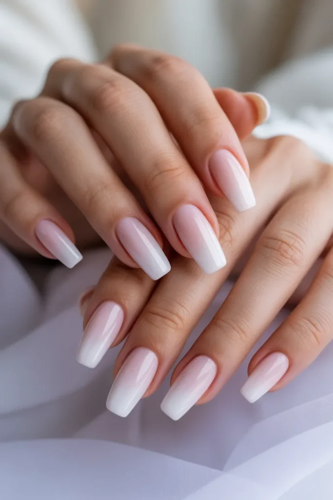 Pink to white ombre nails, coffin shape