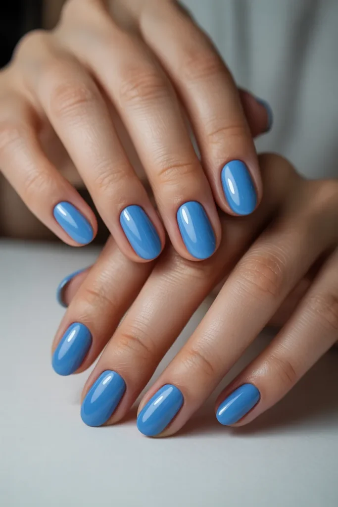 Sky blue glossy oval nails pastel