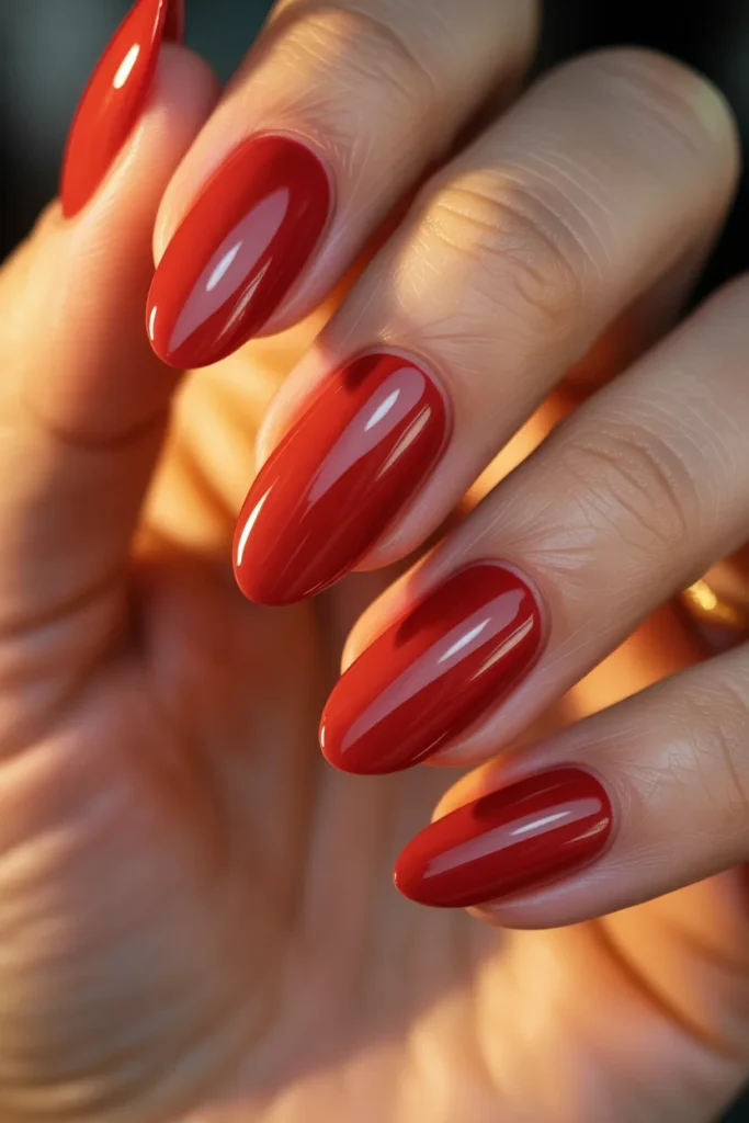 glossy classic red nails, almond shape