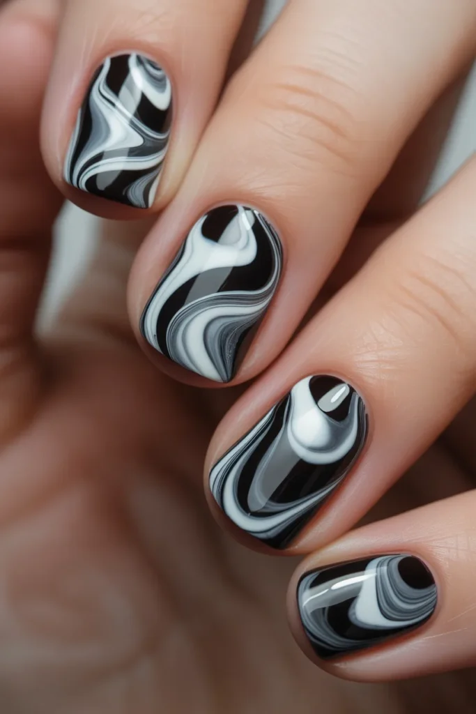 black and white water marble nails