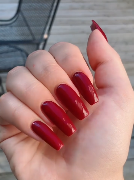 Bold Red Nails with Rhinestone Chains